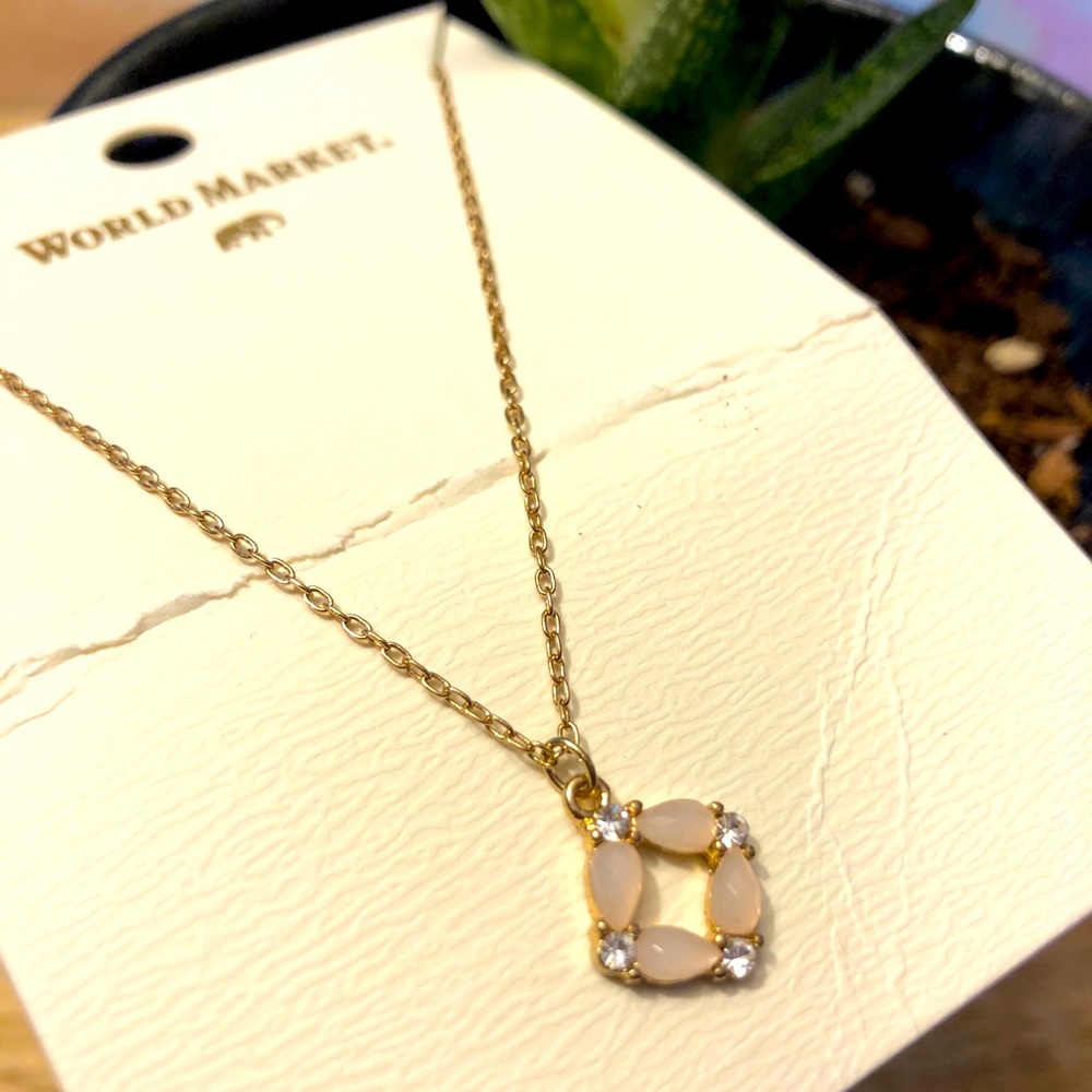 Necklace with gold tone chain